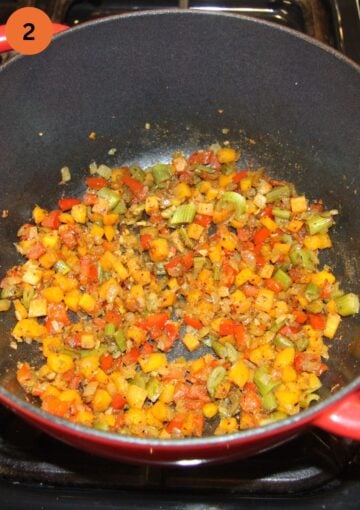 cooked chopped vegetables for soup in a pot.