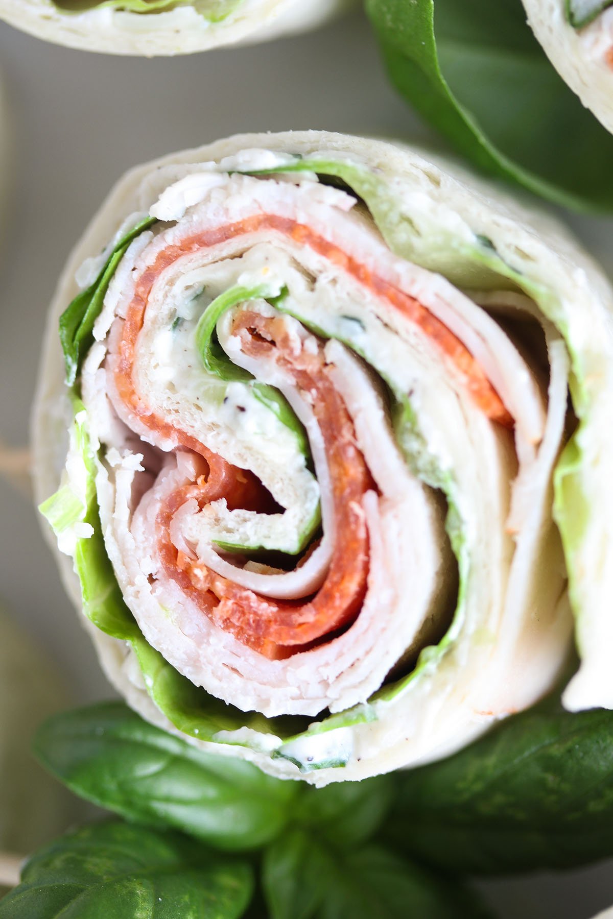 close up of one sandwich pinwheel italian style.