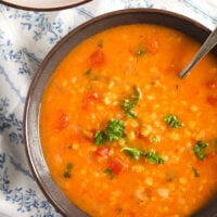 brown bowl with lebanese soup with red lentils.