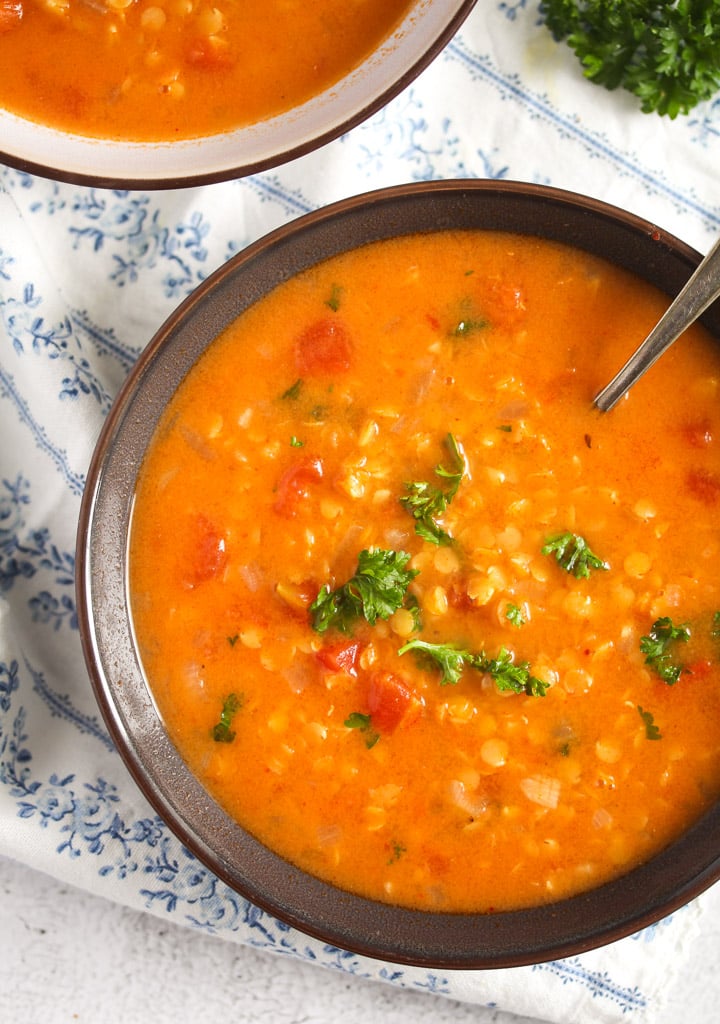 brown bowl with lebanese soup with red lentils.