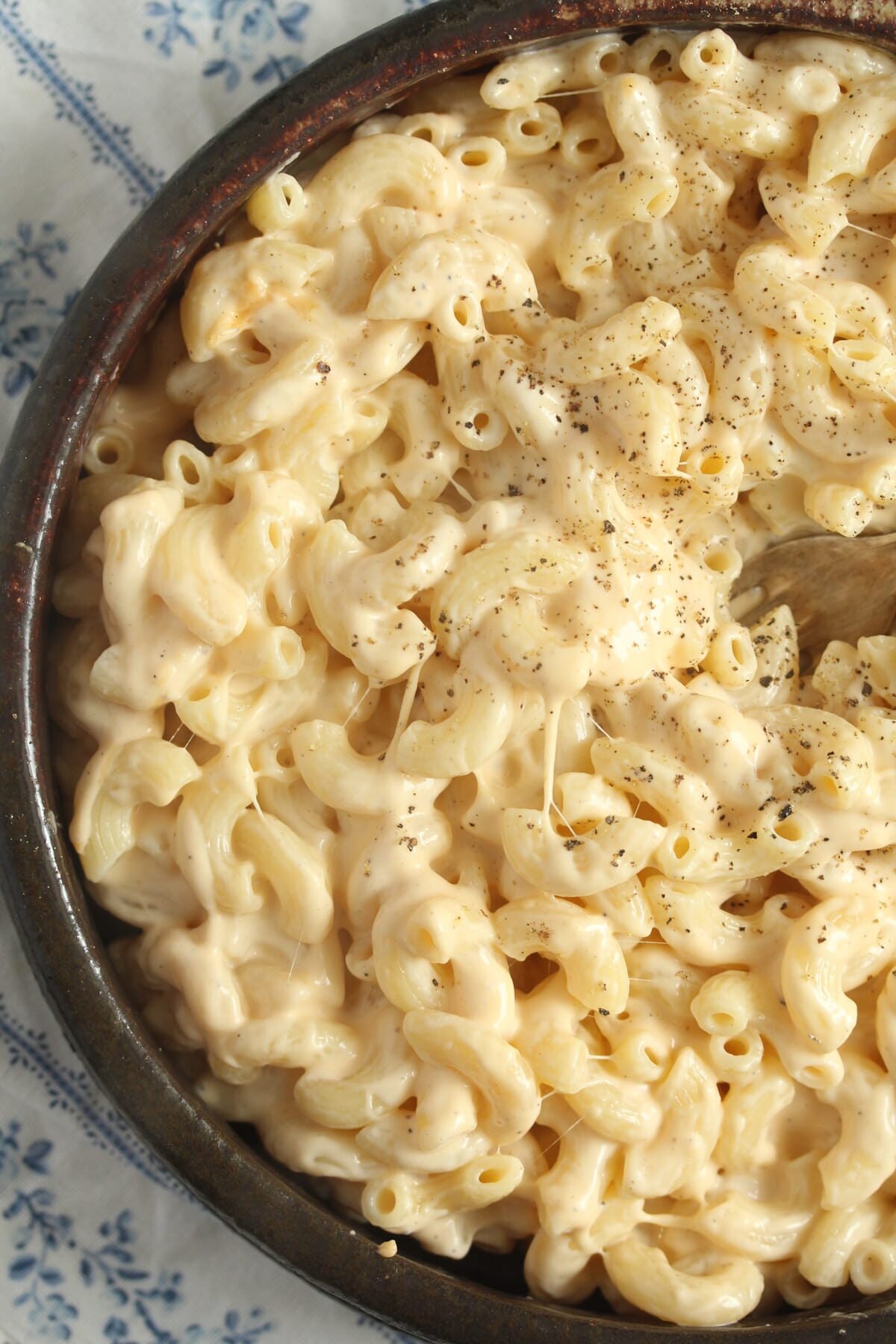 A bowl of homemade mac and cheese without milk.