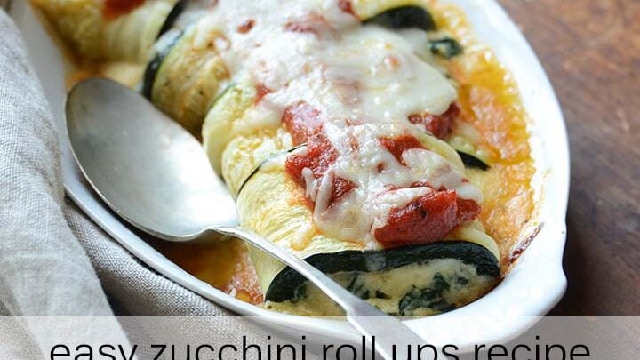 zucchini roll ups with a spoon.