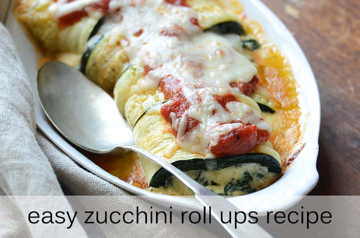 zucchini roll ups with a spoon.
