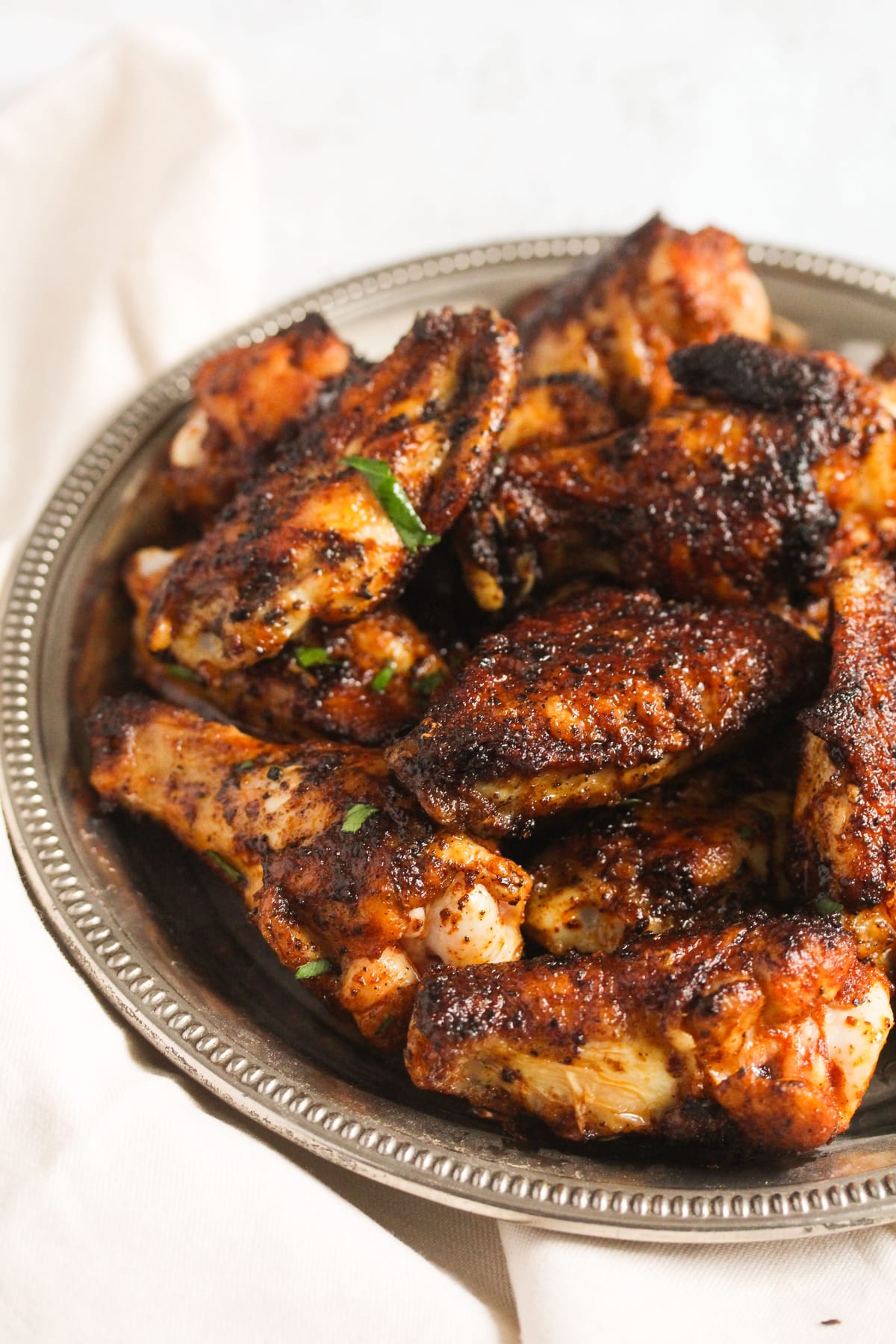 a plate full of cajun dry rub wings.