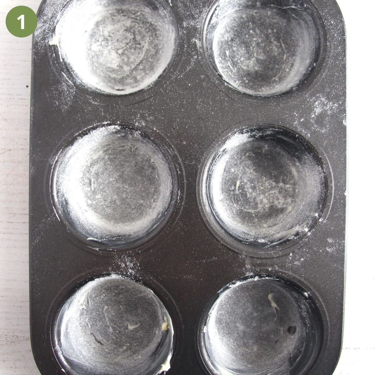 greased and floured muffins tin.