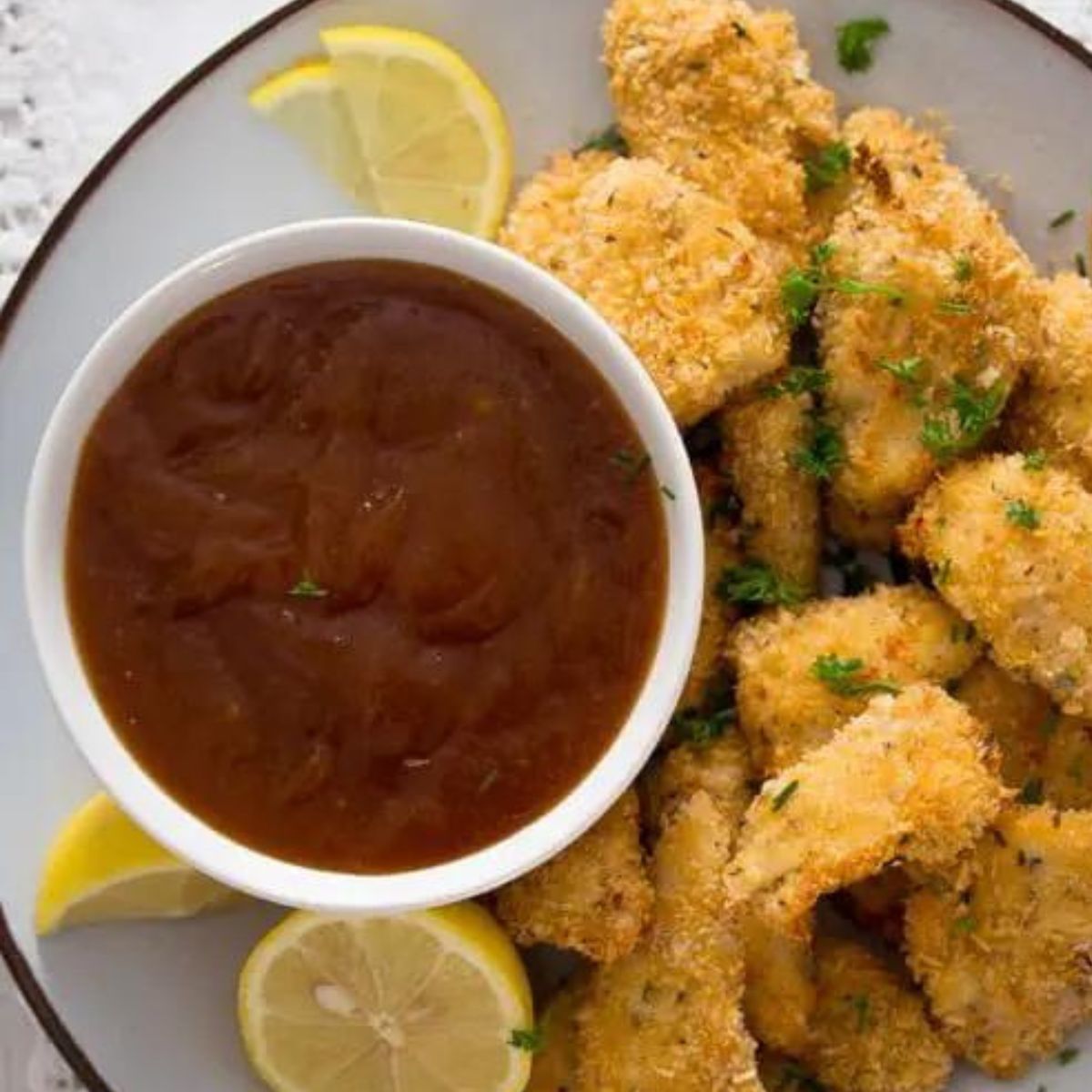 sweet and sour sauce and chicken nuggets.