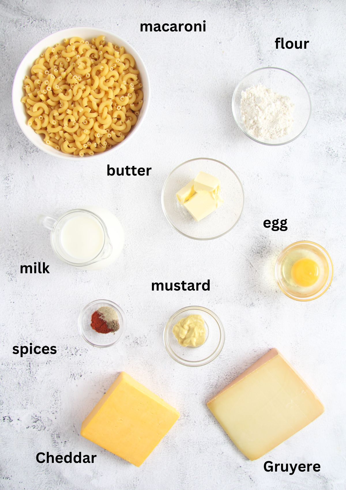 listed ingredients for making macaroni with cheese old-fashioned way.