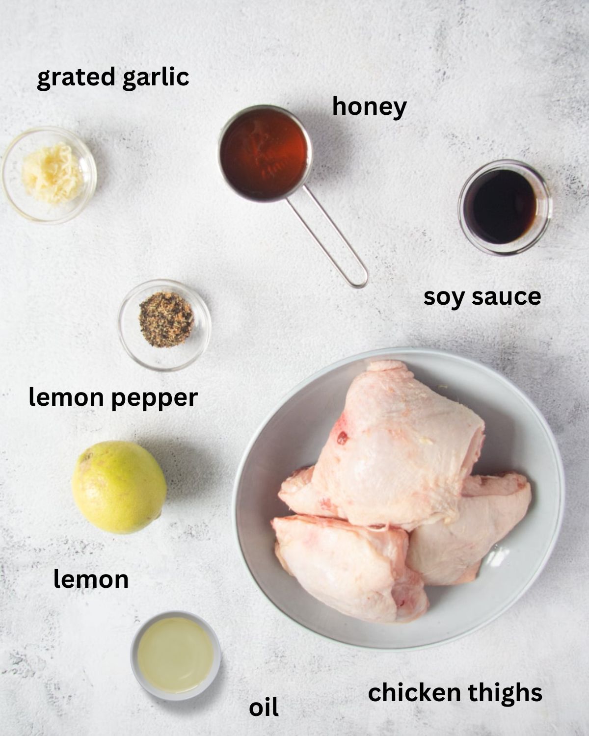 listed ingredients for cooking chicken with lemon pepper and honey sauce.
