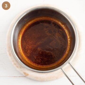 melted butter mixed with ground paprika in a small saucepan.
