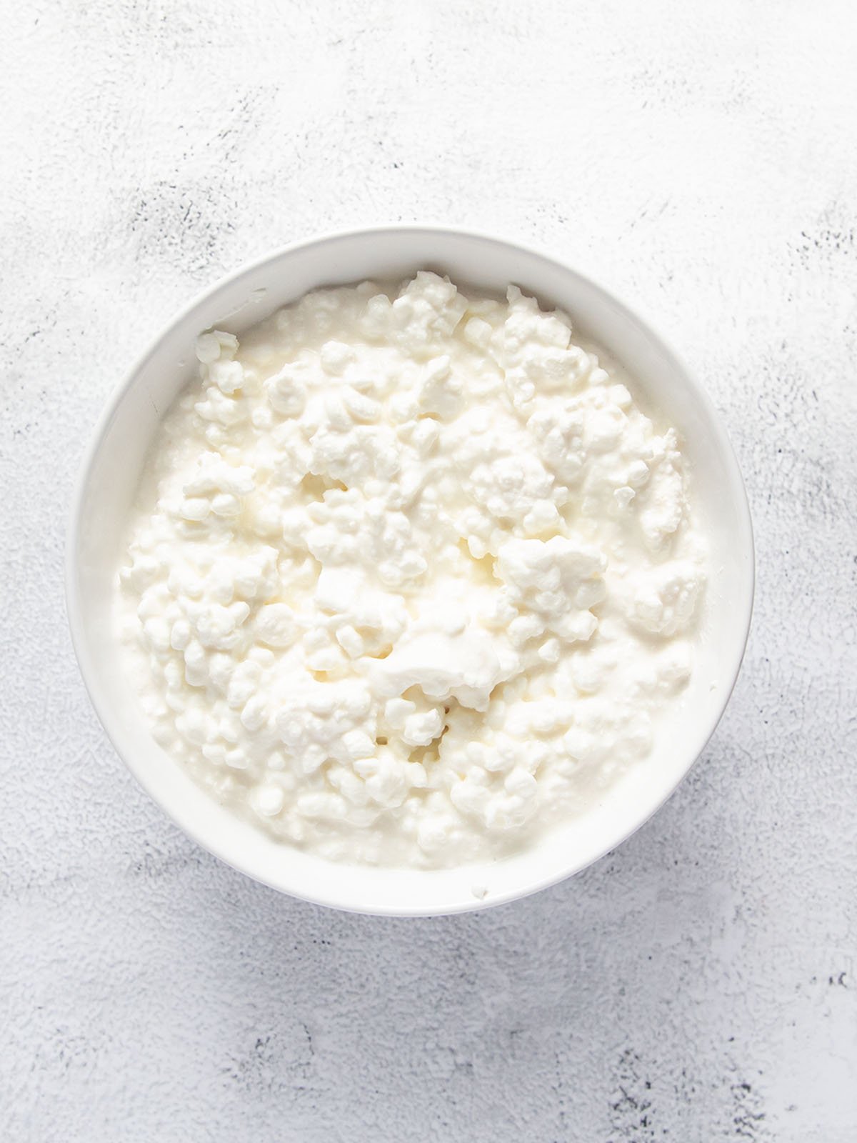 cottage cheese in a small white bowl.