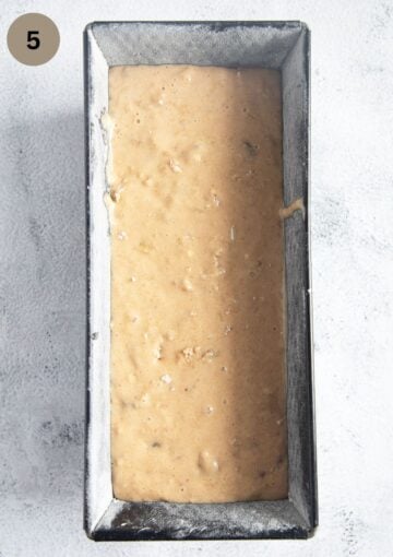 unbaked banana bread batter in a baking tin.