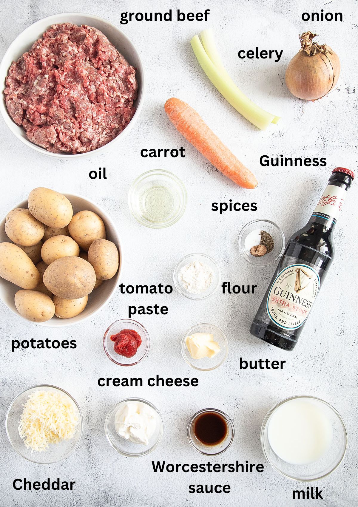 labeled ingredients for making cottage pie with ground beef, guinness and mashed potatoes.
