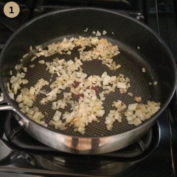 sauteing onions in a saucepan.