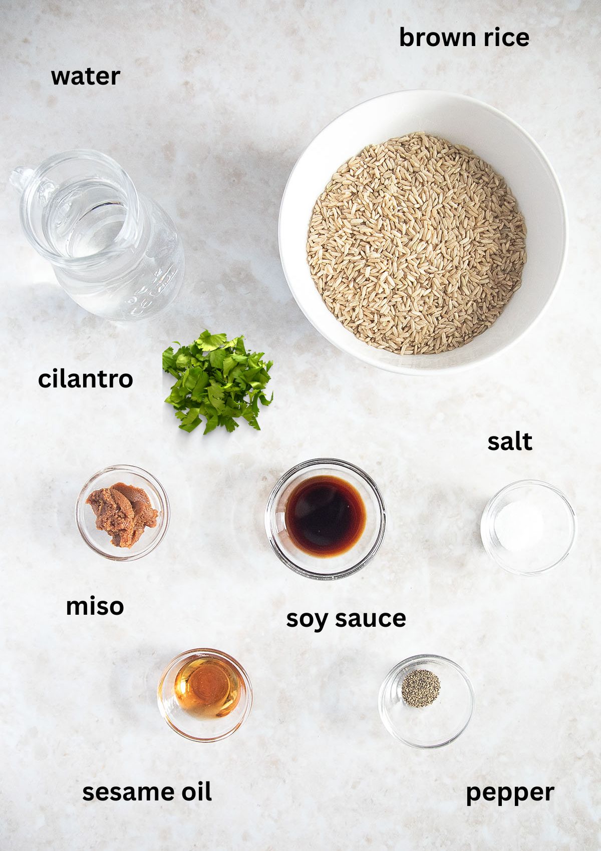 labeled ingredients for making brown rice with miso, soy sauce, sesame oil, and cilantro.