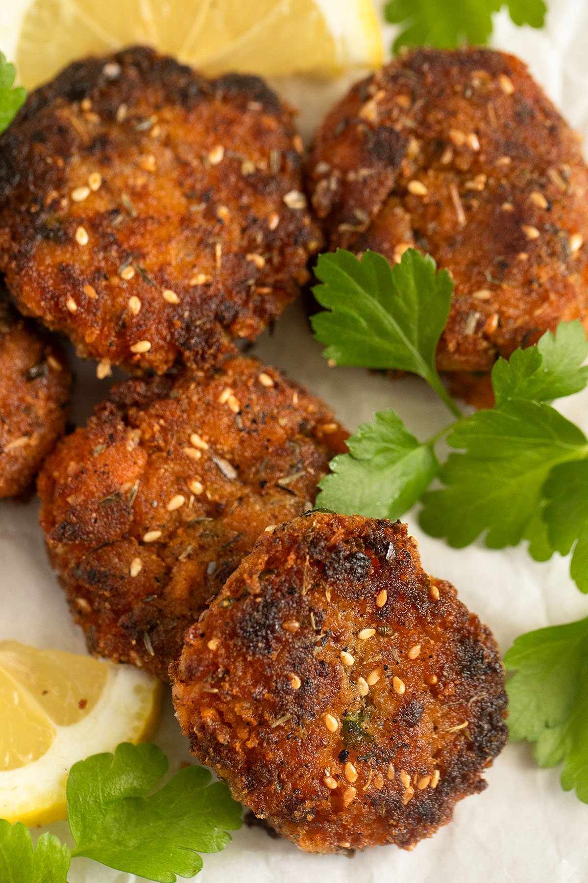 shrimp and sweet potato cakes, lemon slices and fresh cilantro.