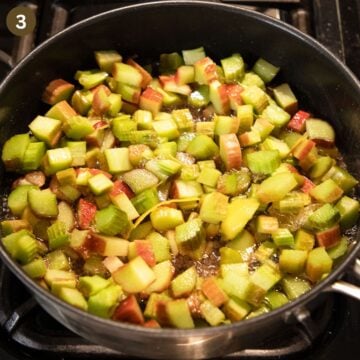 fresh chopped rhubarb cooking in a saucepan.