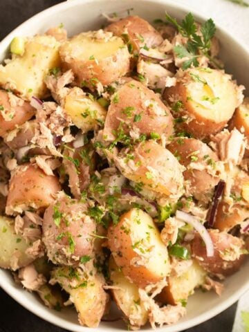 tuna and potato salad in a bowl.