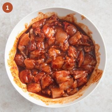chicken cubes marinating in gochujang sauce.