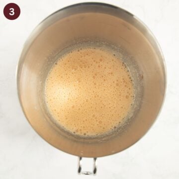 beaten eggs with sugar and oil in a bowl to make cake batter.