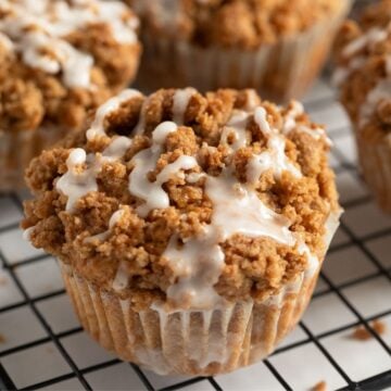 crunchy and golden apple streusel muffins with lemon glaze.
