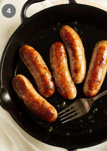 oven baked sausage and a vintage fork in a skillet.