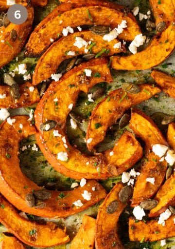 many slices of honey roasted pumpkin with crumbled feta on top.