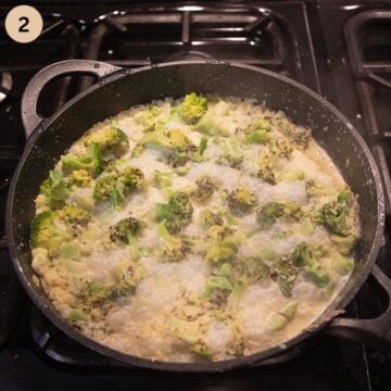 blubbling cream sauce with broccoli for making tuna pasta casserole.