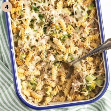 tuna pasta casserole with broccoli, cream and cheese in a baking dish.