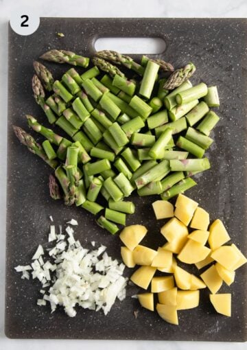 chopped asparagus, potatoes and onions for making soup.
