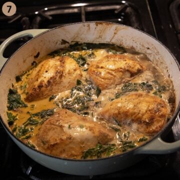 chicken breasts simmering in creamy mushroom and spinach sauce.