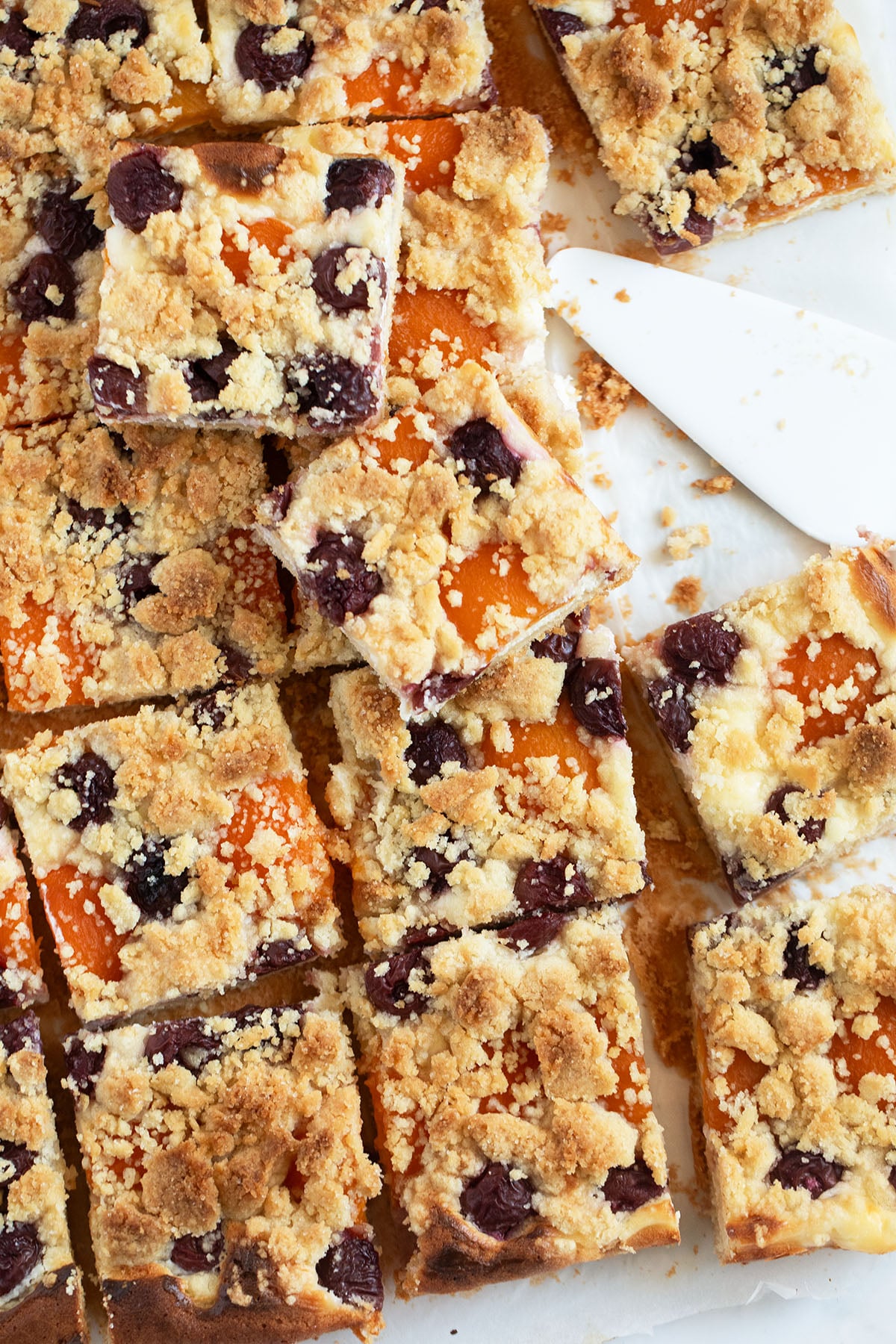 fruit streusel cake cut into squares.