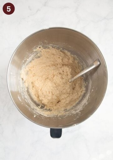 folding dry ingredients into wet to make muffin batter.
