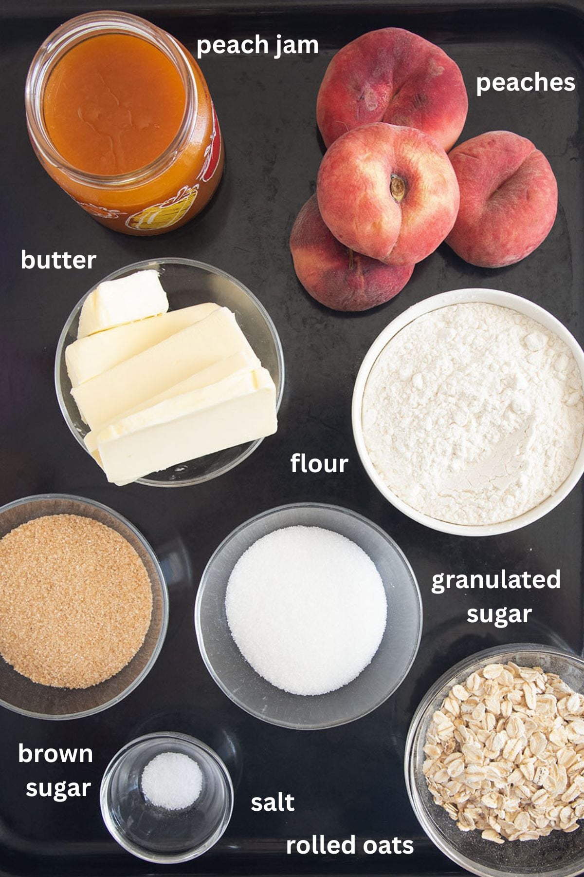 labeled ingredients for making bars with peaches, jam, butter, oats, butter, flour, and sugar.