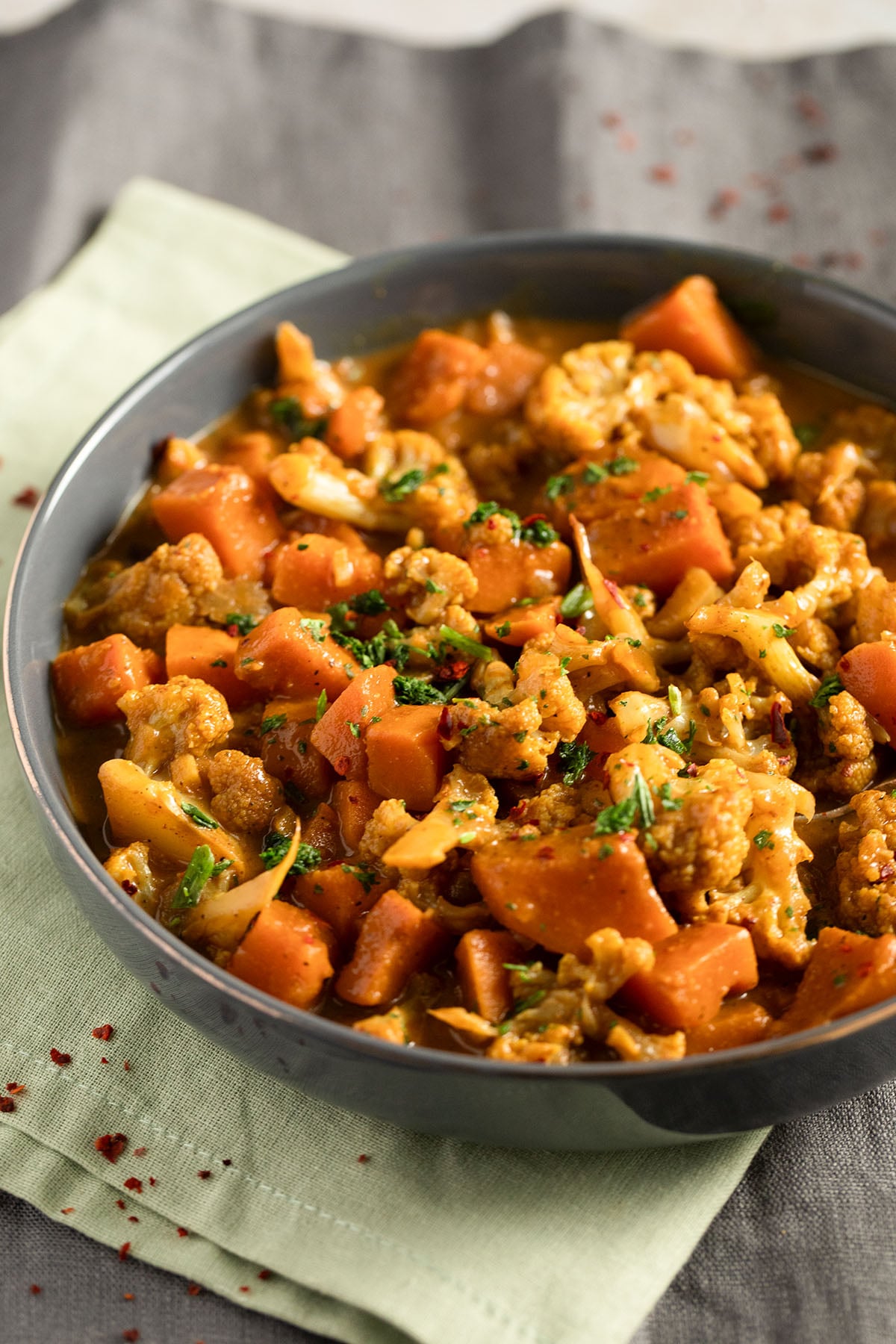 sweet potato cauliflower curry in a large bowl.
