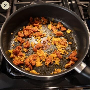 sauteing chorizo, onion and garlic in a skillet.