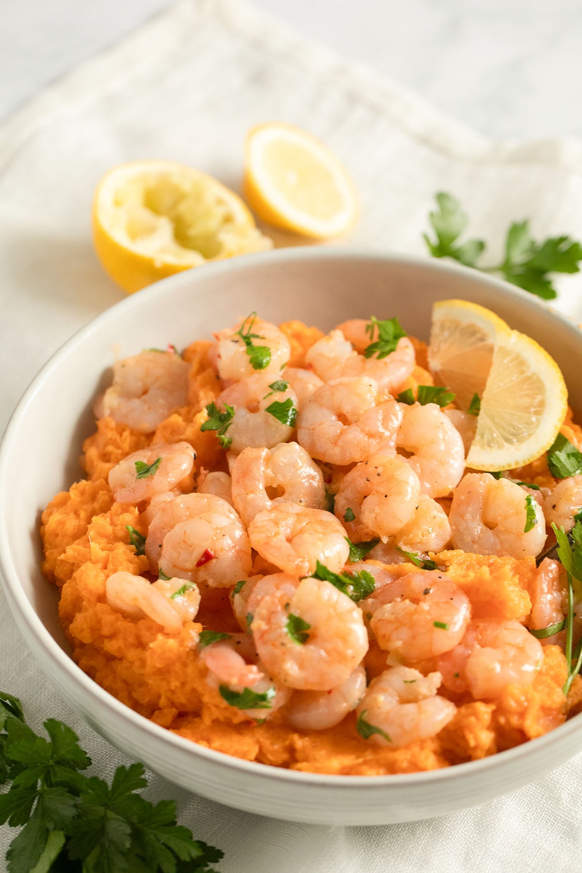 shrimp with creamy sweet potato mash in a bowl.