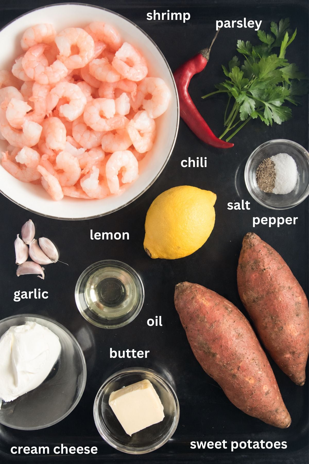 labeled ingredients for making shrimp with sweet potato mash, chili, butter, and garlic.