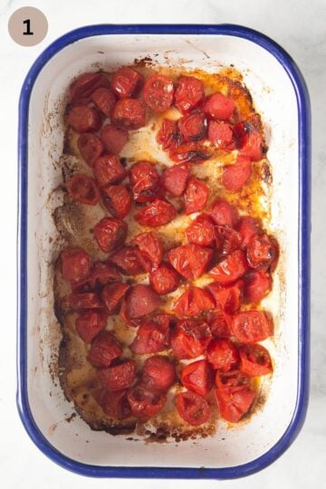roasted, halved grape tomatoes in a roasting dish.